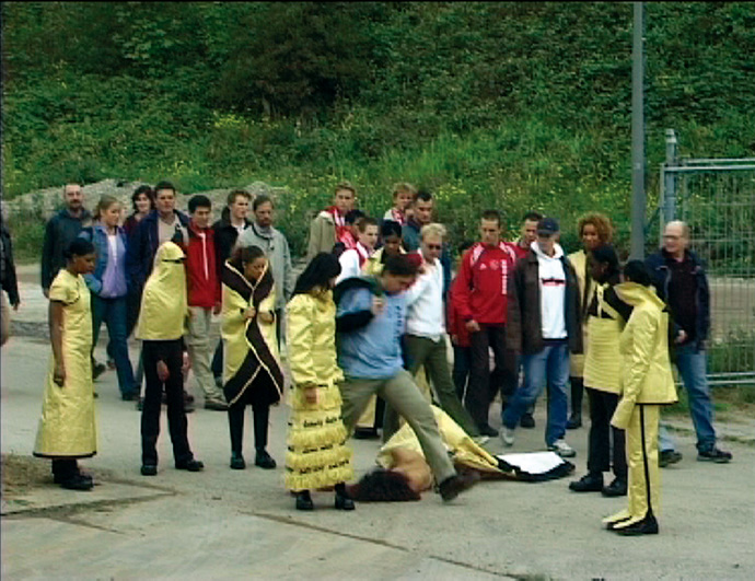 ANTI_DOG (Amsterdam, 2002)
Performance, 2002 - 2003, fashion-demonstrations in Paris, Amsterdam, Madrid, Birmingham, Helsinborg, Barcelona, Venice, featuring a collection of 23 dresses. The anti-dog demonstration magazine called En Garde was inserted in NC magazine, curated by Hussein Chalayan, published by Artimo.  ANTI_DOG (Amsterdam, 2002)
Performance, 2002 - 2003, fashion-demonstrations in Paris, Amsterdam, Madrid, Birmingham, Helsinborg, Barcelona, Venice, featuring a collection of 23 dresses. The anti-dog demonstration magazine called En Garde was inserted in NC magazine, curated by Hussein Chalayan, published by Artimo.